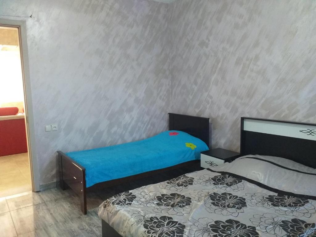 Postel nebo postele na pokoji v ubytování Family Hotel Andria