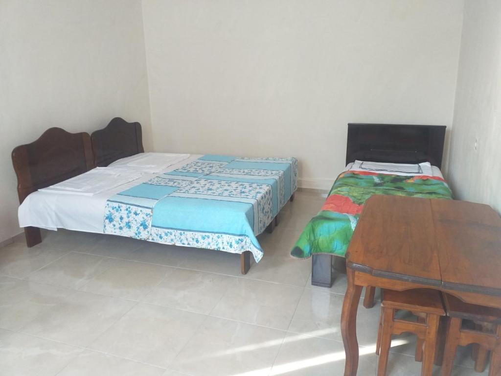 Postel nebo postele na pokoji v ubytování Family Hotel Andria