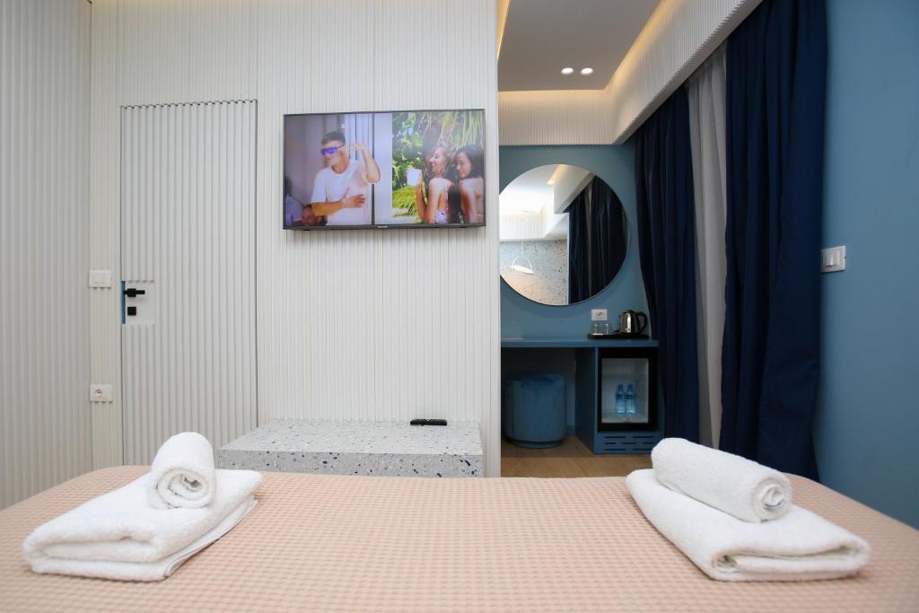 Postel nebo postele na pokoji v ubytování Imperial Visar Rooms