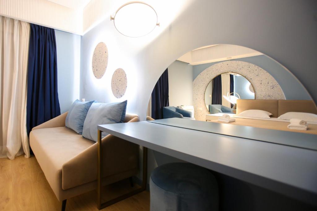 Postel nebo postele na pokoji v ubytování Imperial Visar Rooms