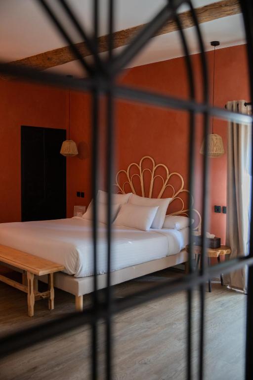 Postel nebo postele na pokoji v ubytování Maison Roucas - Restaurant et chambres d'hôtes