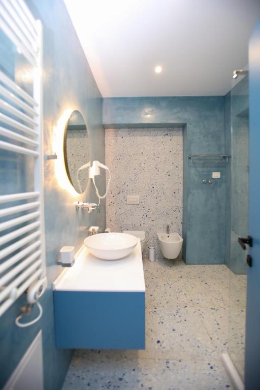 Koupelna v ubytování Imperial Visar Rooms