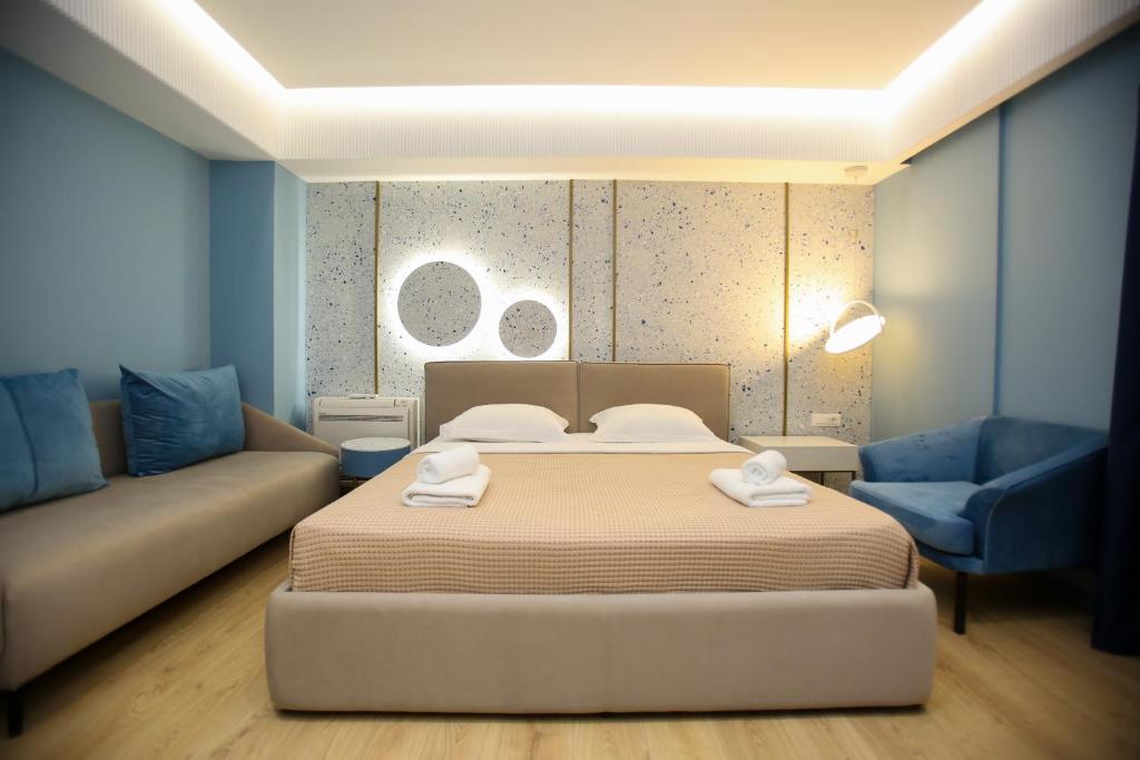 Postel nebo postele na pokoji v ubytování Imperial Visar Rooms