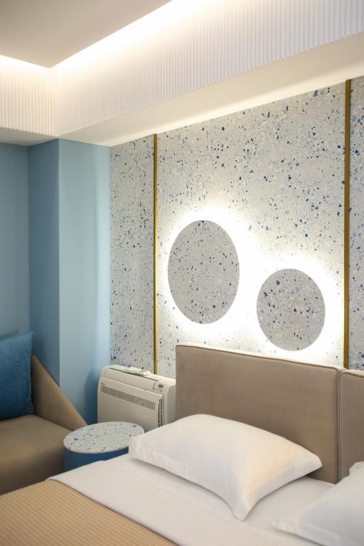 Postel nebo postele na pokoji v ubytování Imperial Visar Rooms