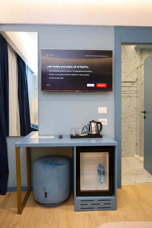 TV a/nebo společenská místnost v ubytování Imperial Visar Rooms