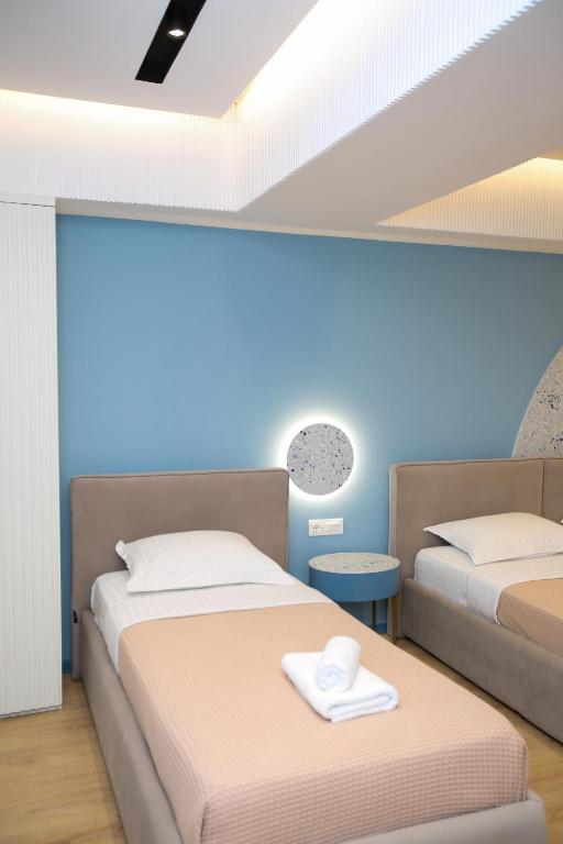 Postel nebo postele na pokoji v ubytování Imperial Visar Rooms