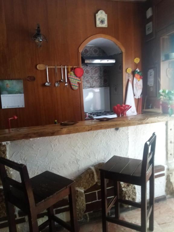 Kuchyň nebo kuchyňský kout v ubytování Albergo Andromeda