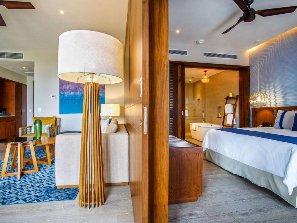 Postel nebo postele na pokoji v ubytování Armony Marival Resort & Spa Punta de Mita - MGallery collection