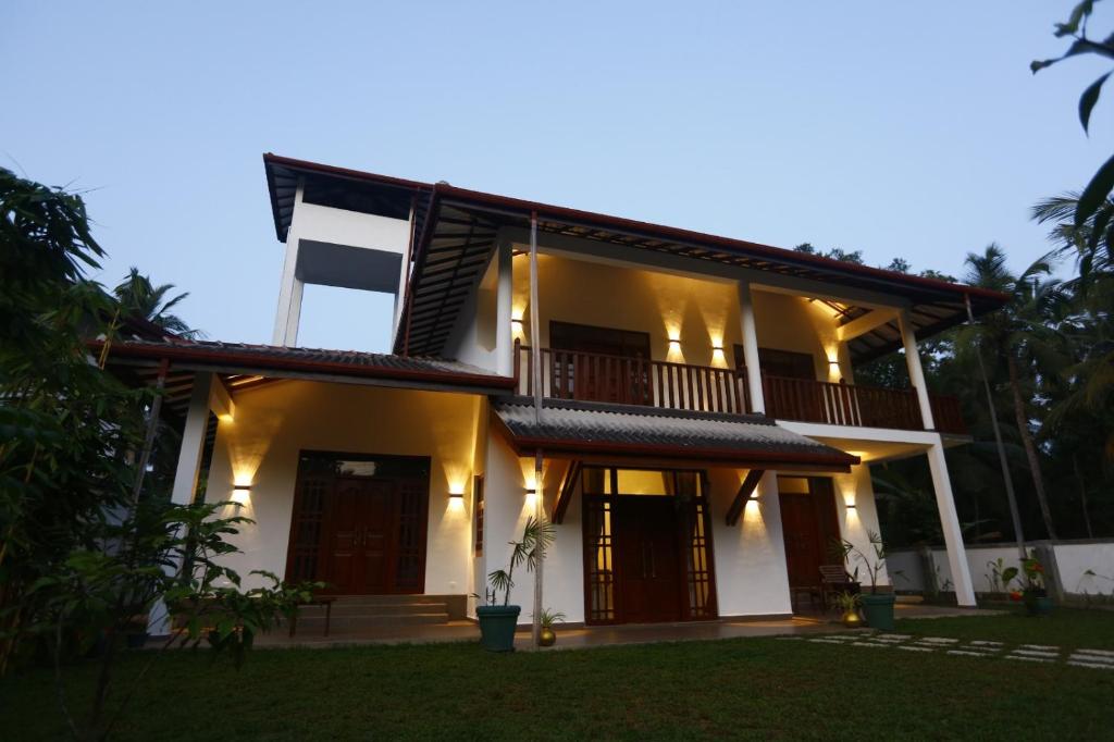 an image of a house at night at Lila Lodge, Villa - Bentota in Bentota
