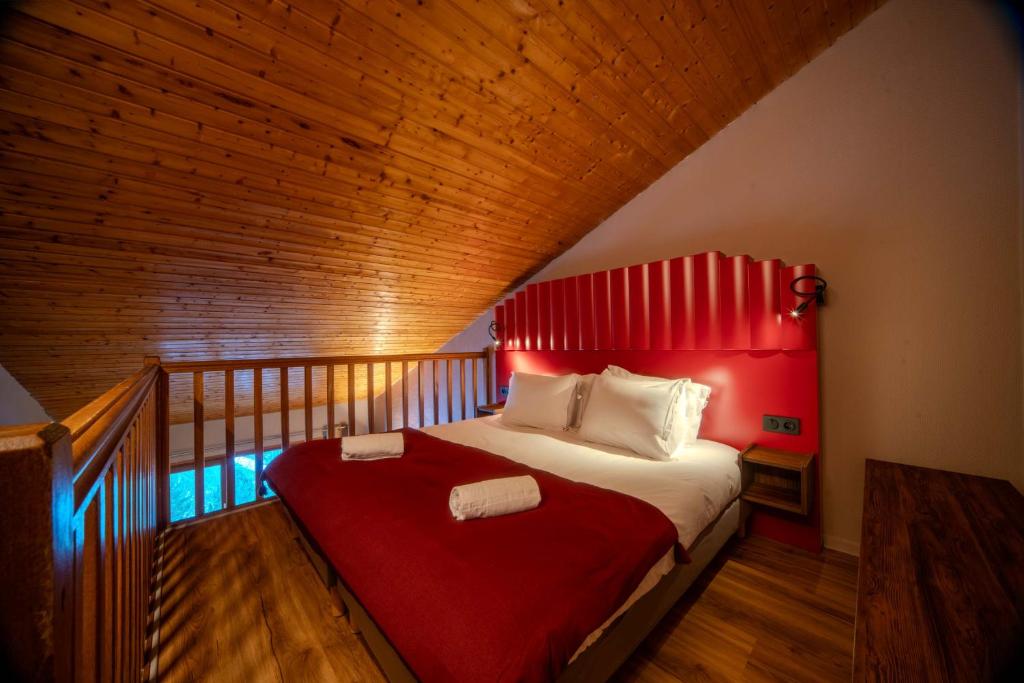 Postel nebo postele na pokoji v ubytování Alpeen Hotel
