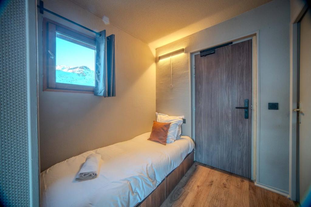 Postel nebo postele na pokoji v ubytování Alpeen Hotel