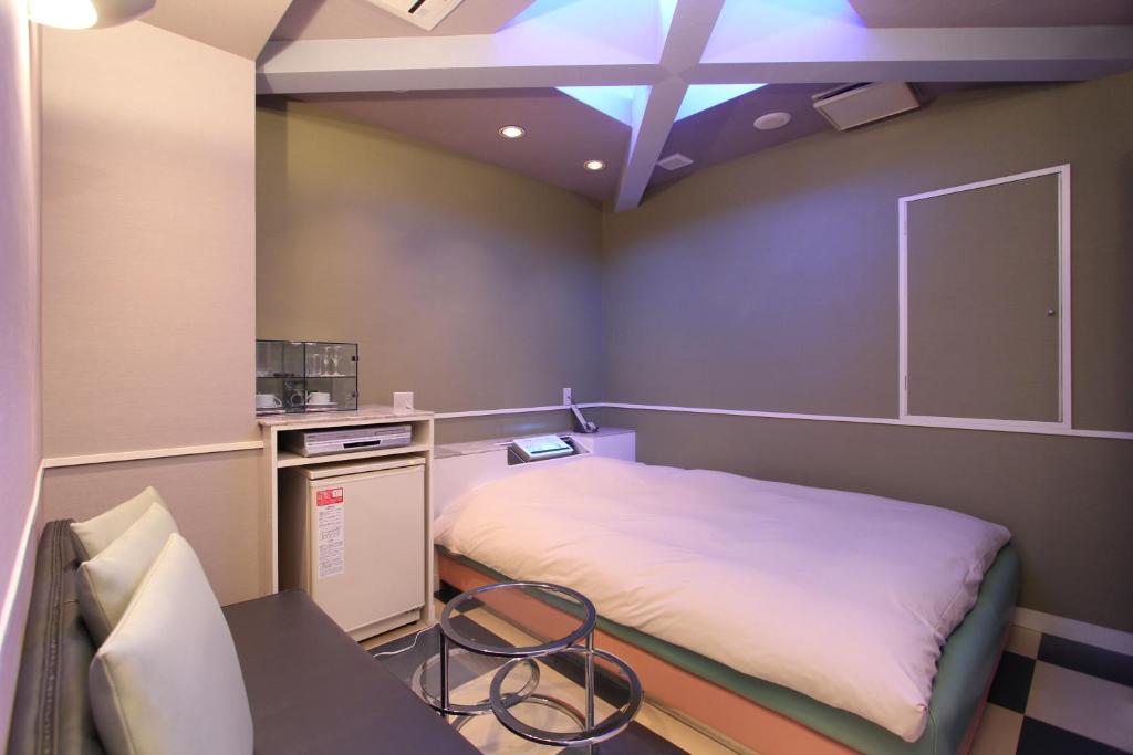 Postel nebo postele na pokoji v ubytování HOTEL DCUBE