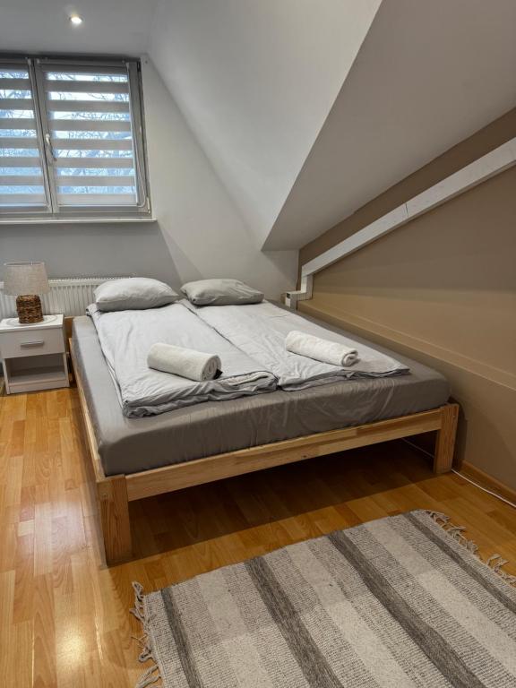 Postel nebo postele na pokoji v ubytování ESA Home
