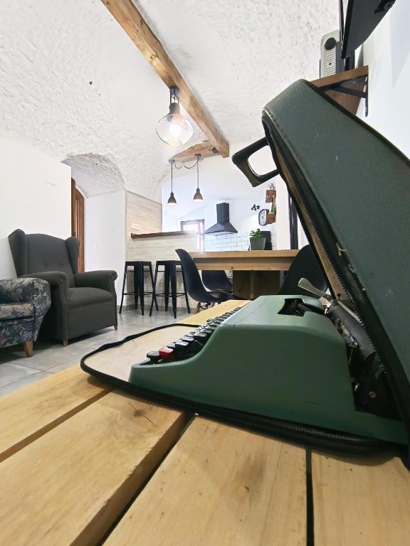 Televízia a/alebo spoločenská miestnosť v ubytovaní La Madriguera Eco Caves