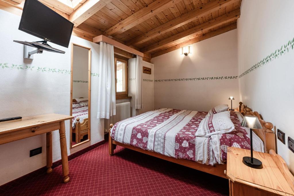 Postel nebo postele na pokoji v ubytování Hotel Job