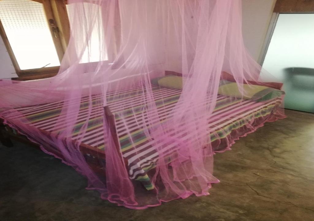 Postel nebo postele na pokoji v ubytování Skykite Resort & Hostel Kalpitiya Sri Lanka