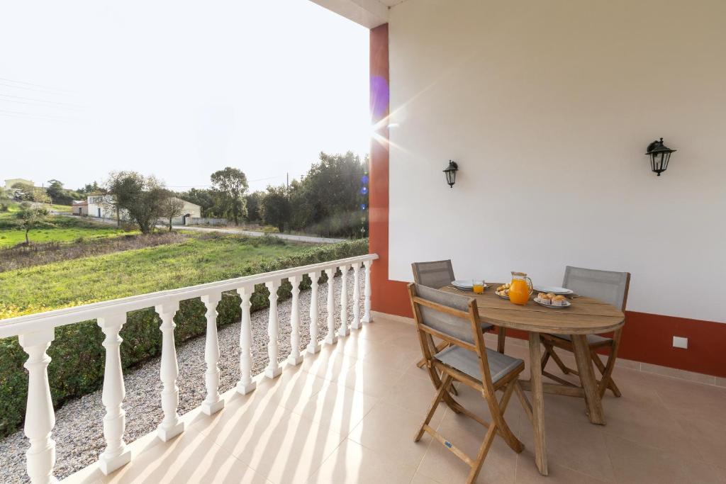 En balkon eller terrasse på Casa das Pêras
