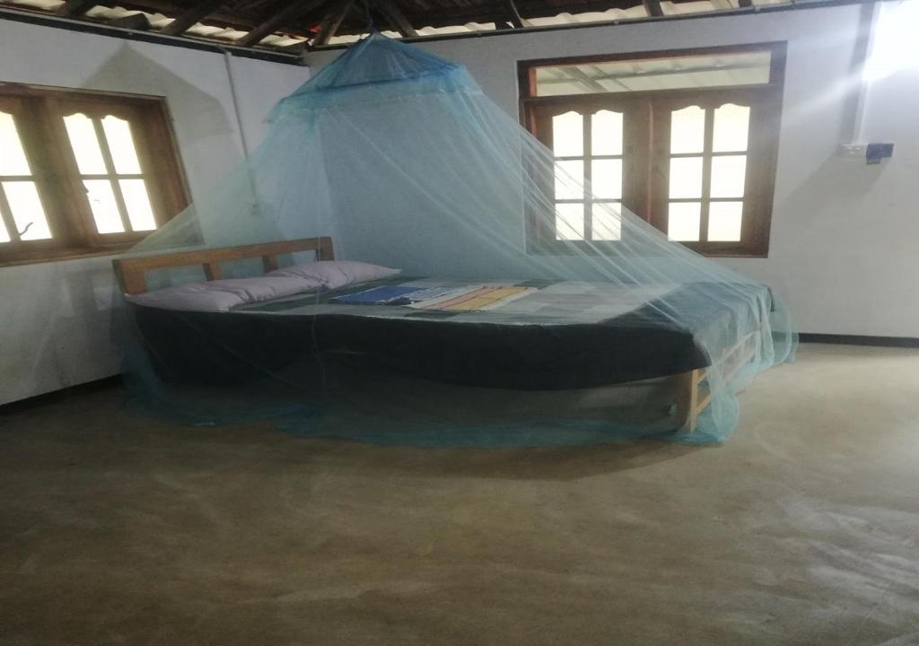 Postel nebo postele na pokoji v ubytování Skykite Resort & Hostel Kalpitiya Sri Lanka
