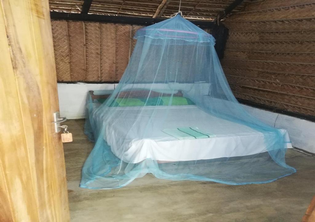 Postel nebo postele na pokoji v ubytování Skykite Resort & Hostel Kalpitiya Sri Lanka