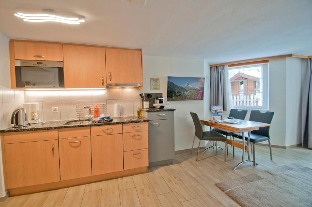 Kuchyň nebo kuchyňský kout v ubytování Chalet Aeschhorn
