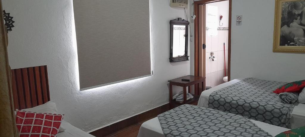 Hostel Néli - Quadruple Room With Bathroom