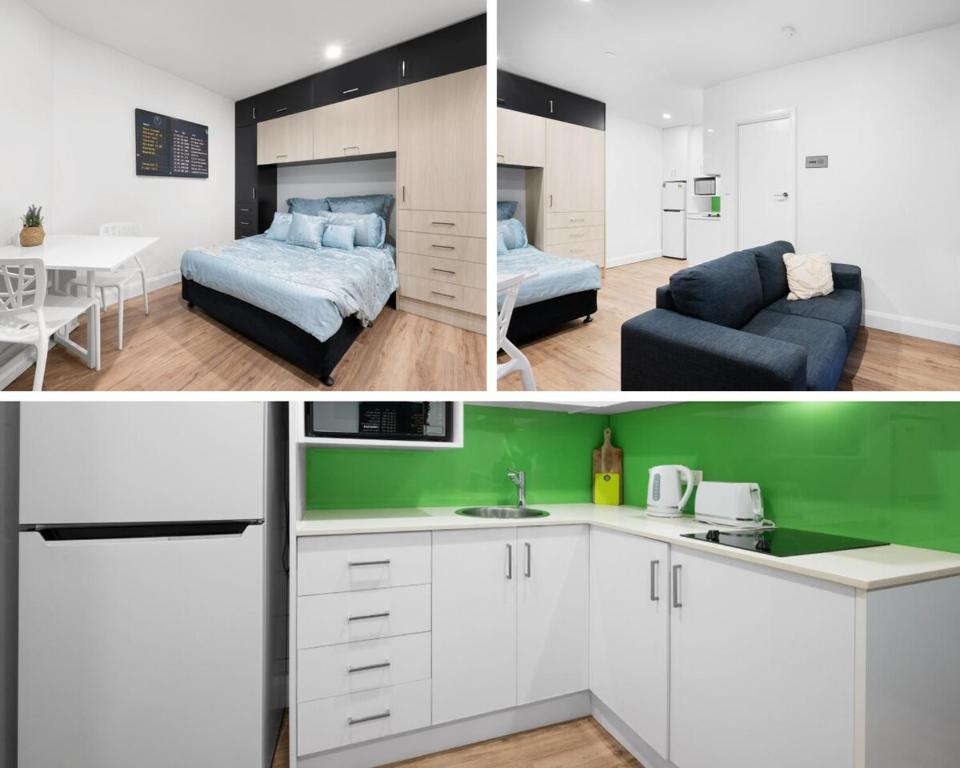a kitchen and a living room with a bed and a table at 611 Lovely Central Super Cosy Studio Heart CBD in Melbourne