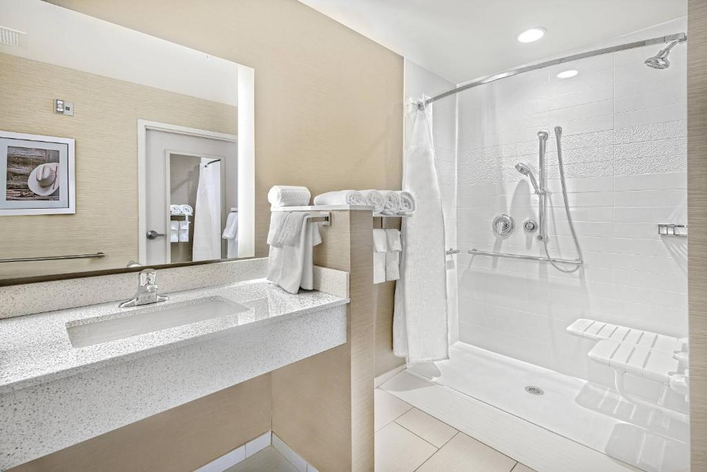 a white bathroom with a sink and a shower at Fairfield Inn & Suites by Marriott Van in Van