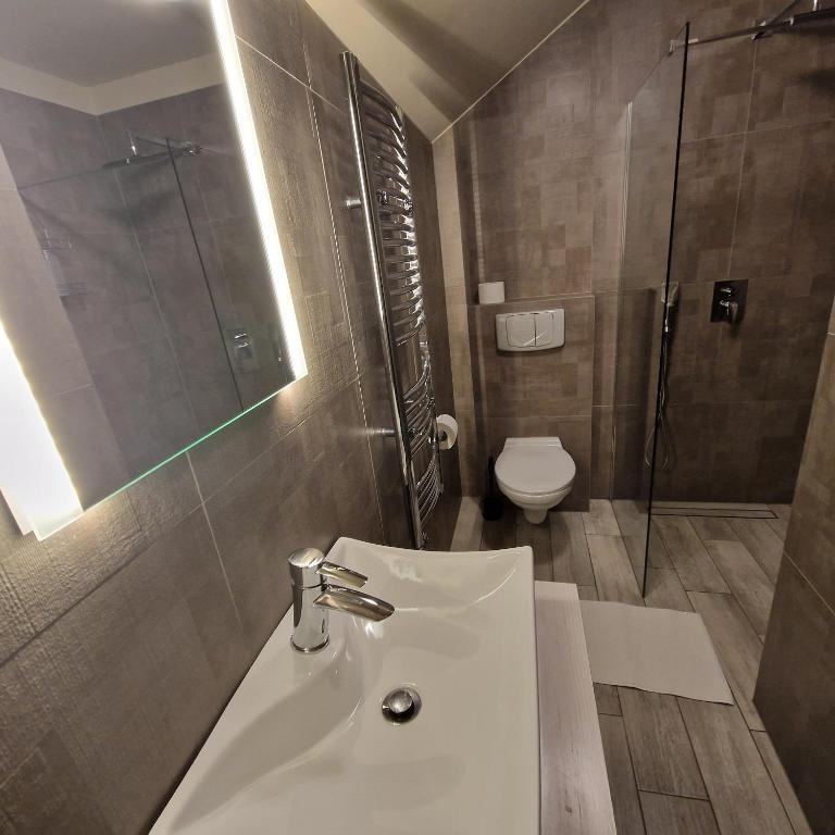 Kúpeľňa v ubytovaní Tajemniczy Ogród Szczytna - Bed & Breakfast