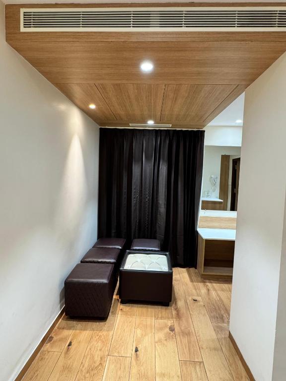 Postel nebo postele na pokoji v ubytování HOTEL TOUCHWOOD