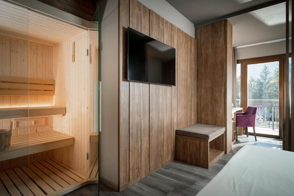 Postel nebo postele na pokoji v ubytování Miramonti Park Hotel