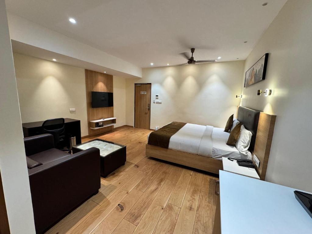 Postel nebo postele na pokoji v ubytování HOTEL TOUCHWOOD