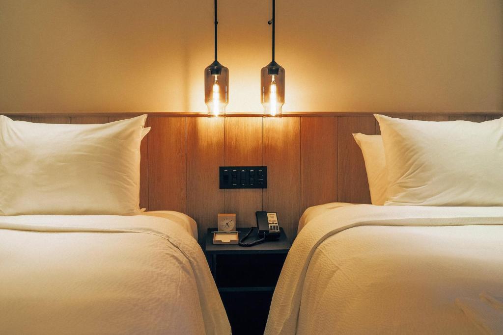 Postel nebo postele na pokoji v ubytování Fairfield by Marriott Gifu Mino
