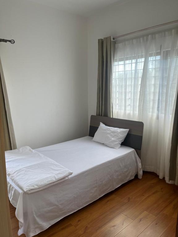 Postel nebo postele na pokoji v ubytování Sea La Vie Villa