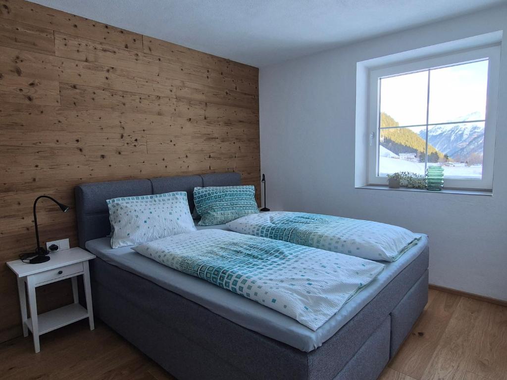 Postel nebo postele na pokoji v ubytování HAGGNER Hideaway