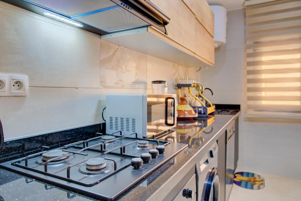 Kuchyň nebo kuchyňský kout v ubytování Golden Appartement Agadir
