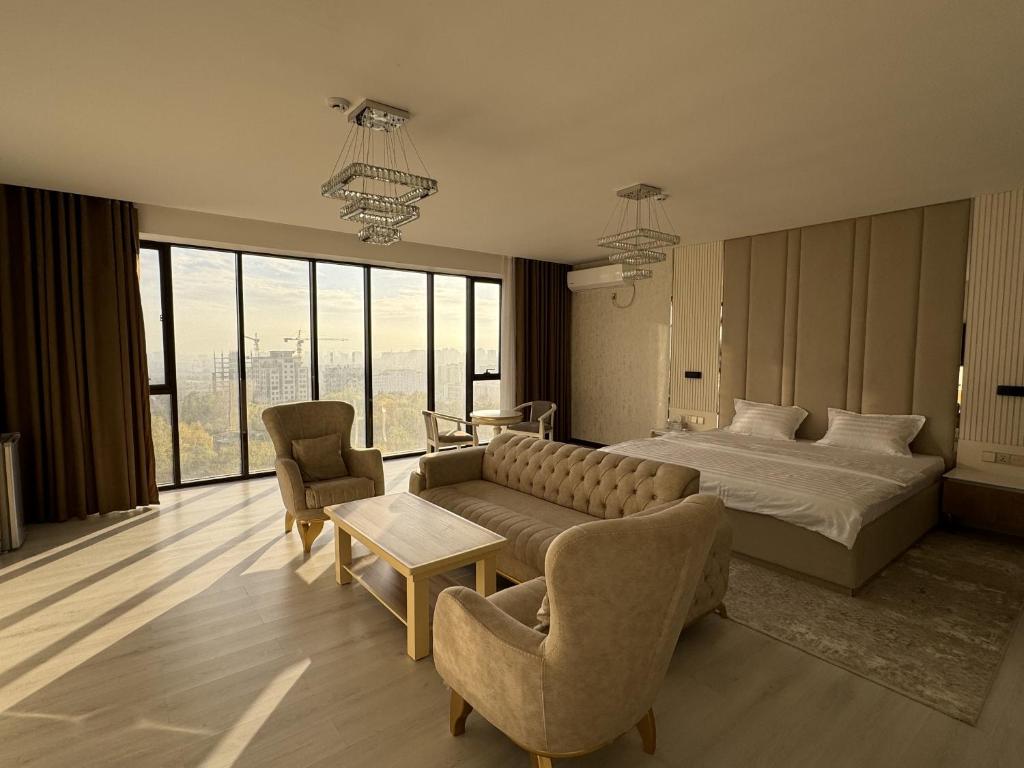 Postel nebo postele na pokoji v ubytování Aram Hotel