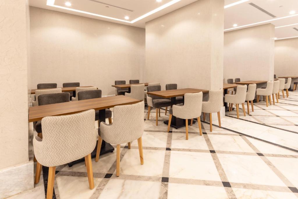 Restaurace v ubytování فندق شبا الماسي