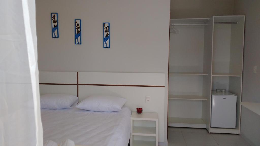 Postel nebo postele na pokoji v ubytování BoraBora Pousada