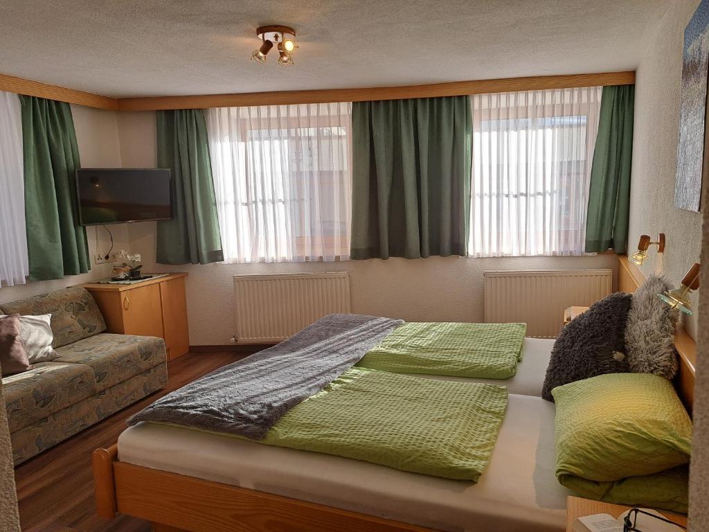 Posteľ alebo postele v izbe v ubytovaní Appartements Klapeer