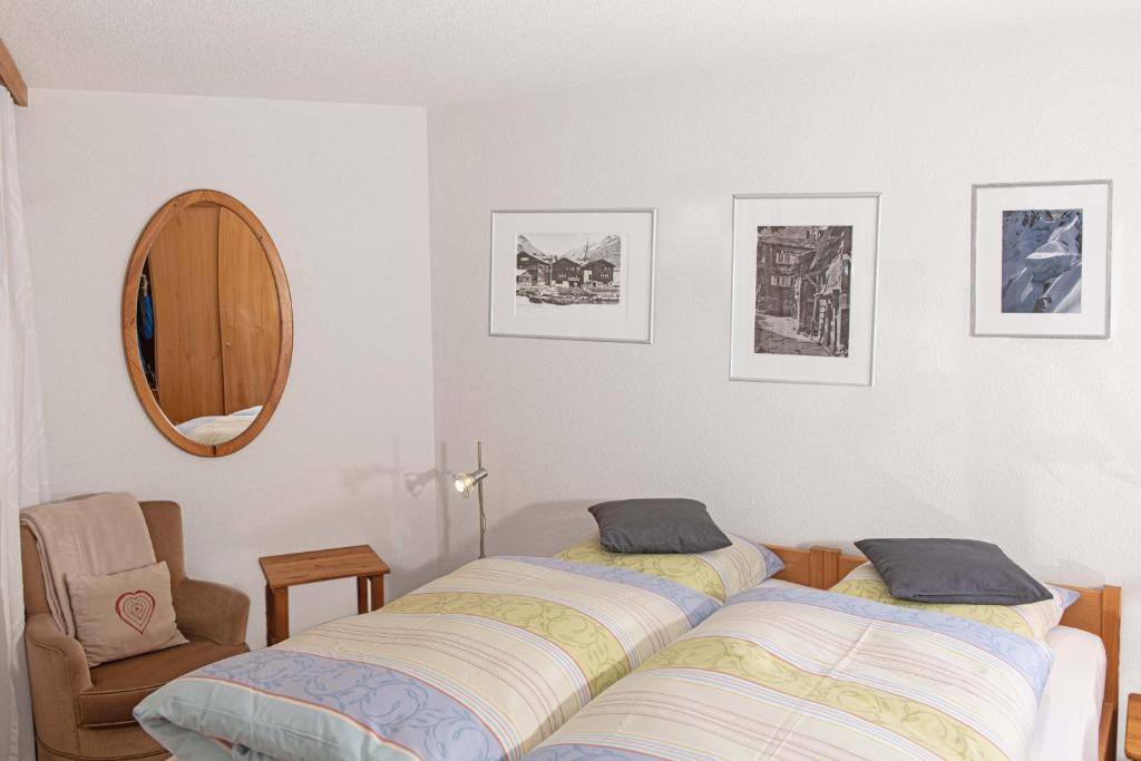 Postel nebo postele na pokoji v ubytování Haus Laurin