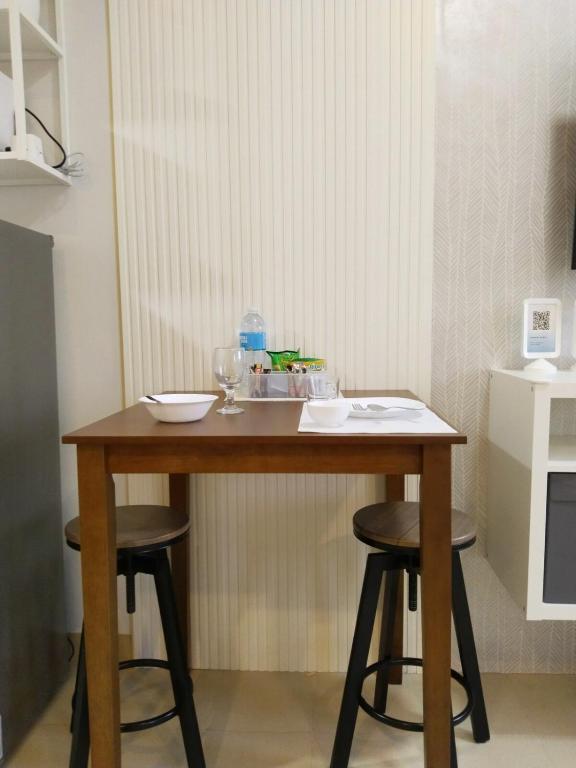 Kuchyň nebo kuchyňský kout v ubytování APT at G-207 in SMDC Cheer Residences