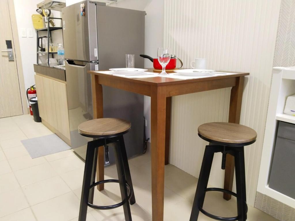 Kuchyň nebo kuchyňský kout v ubytování APT at G-207 in SMDC Cheer Residences
