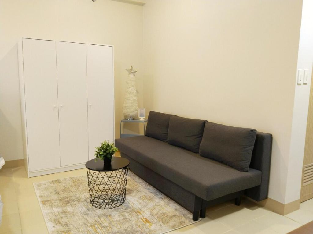 Posezení v ubytování APT at G-207 in SMDC Cheer Residences