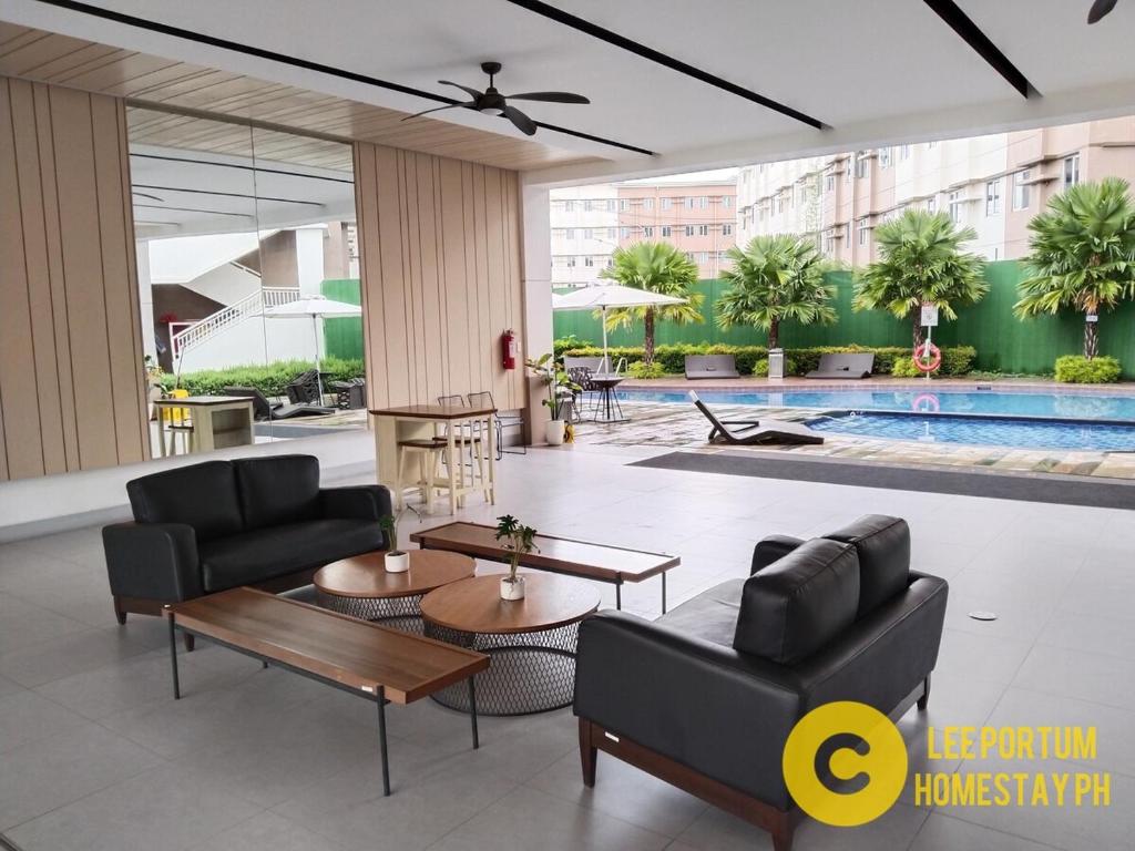 Bazén v ubytování APT at G-207 in SMDC Cheer Residences nebo v jeho okolí