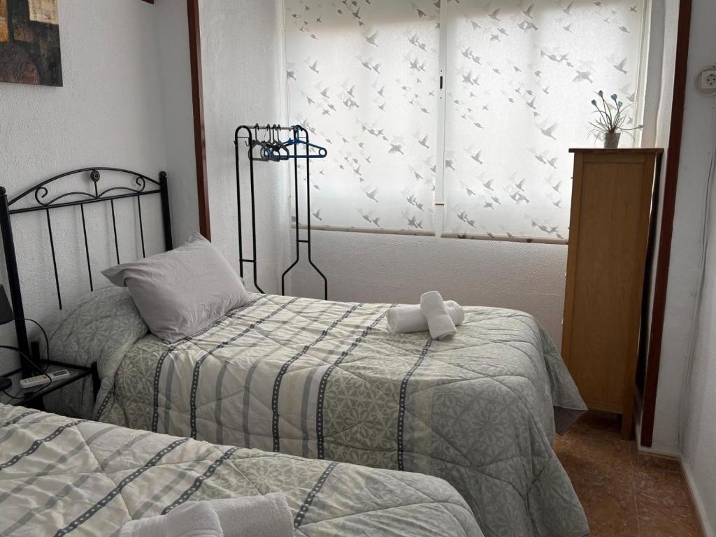 Posteľ alebo postele v izbe v ubytovaní CASA DE ANA