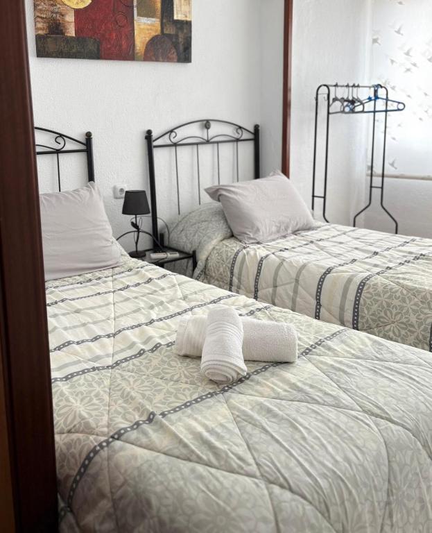 Posteľ alebo postele v izbe v ubytovaní CASA DE ANA