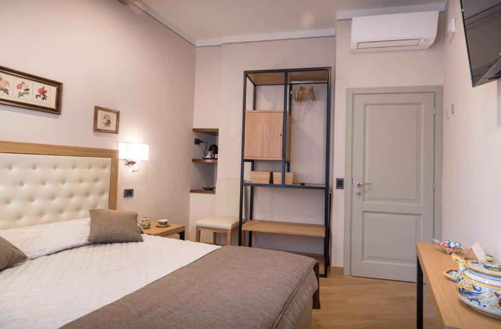 Postel nebo postele na pokoji v ubytování Brunelli B&B