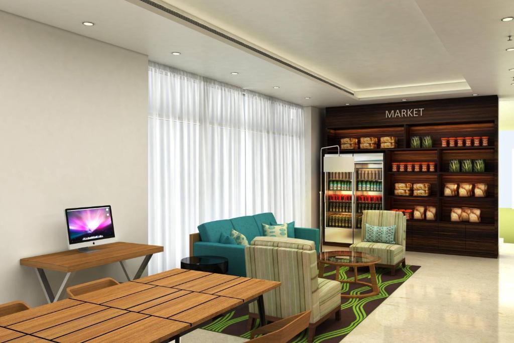 TV a/nebo společenská místnost v ubytování Fairfield by Marriott Pune Kharadi