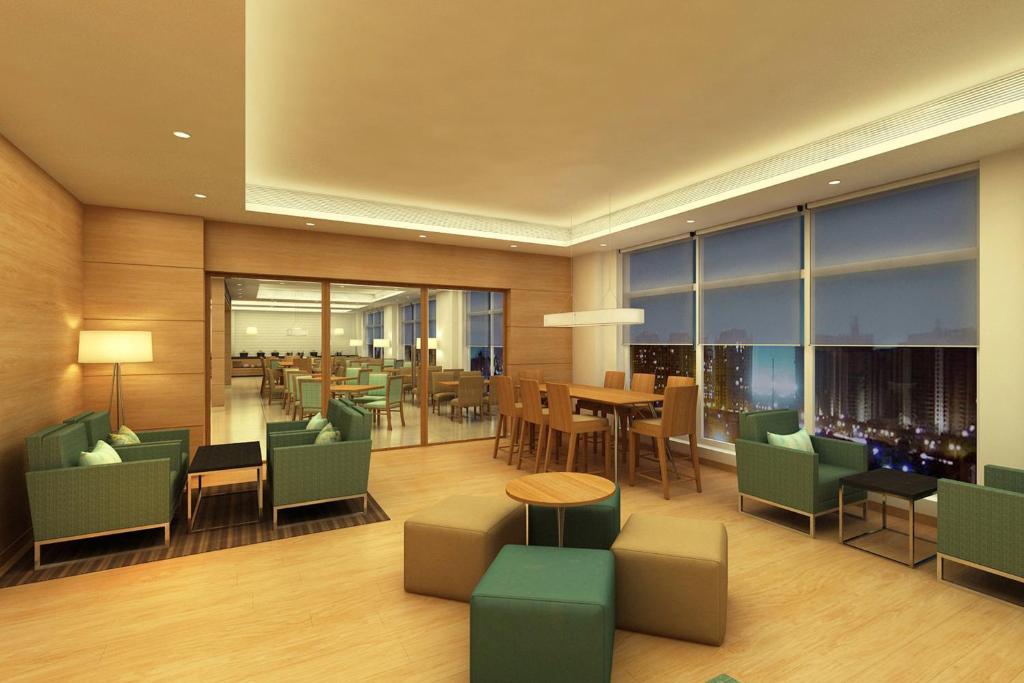 Posezení v ubytování Fairfield by Marriott Pune Kharadi