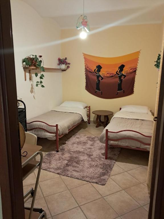 Postel nebo postele na pokoji v ubytování Cascina Argo